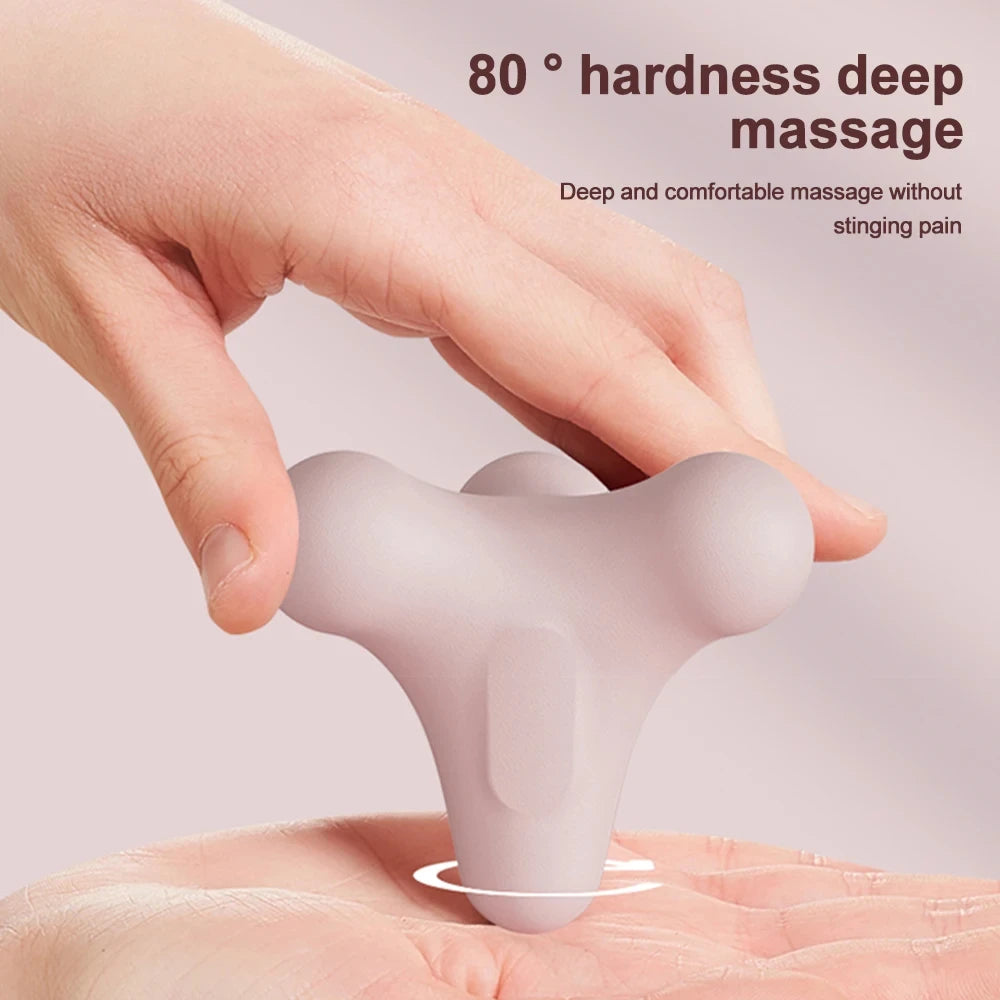 Ergonomic three-pronged massage tool being pressed into palm for deep tissue relief with 80° hardness rating
