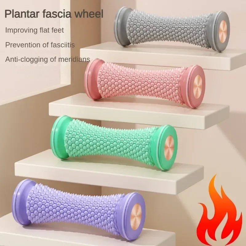 Four color variants of foot rollers on staircase: gray, pink, green, purple