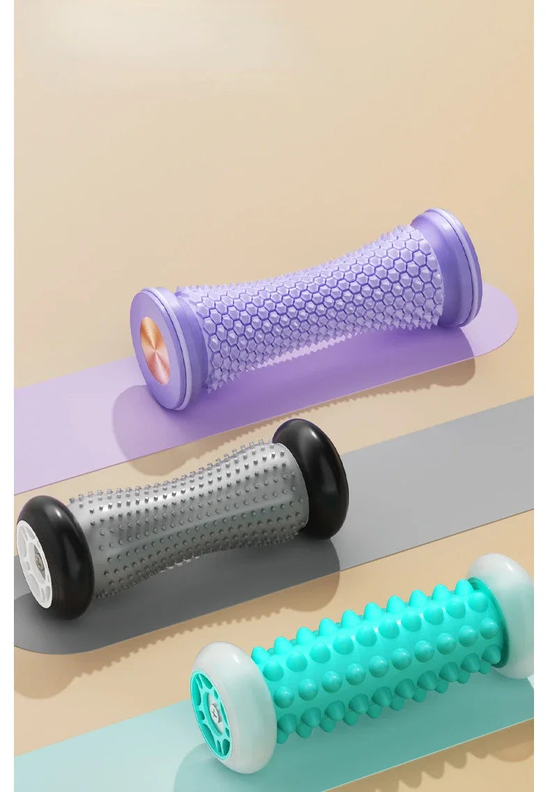 Purple, gray, and teal foot massage rollers displayed with varied textures and end cap styles